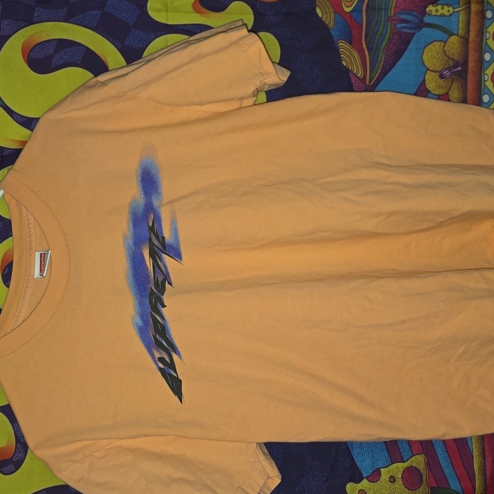 Supreme Tee in Coral Orange with Blue Accents